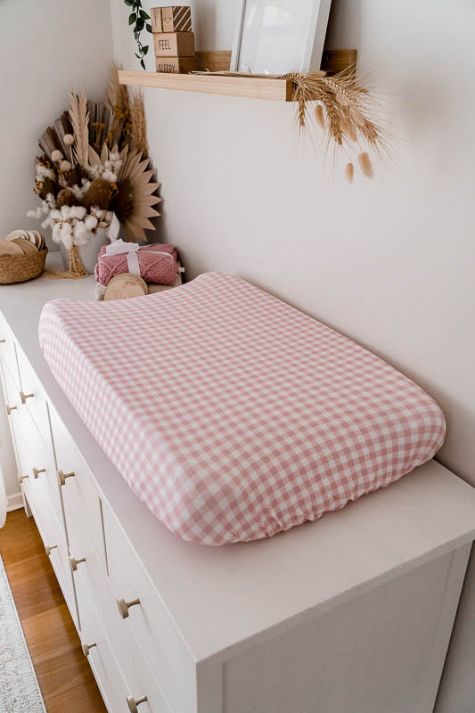 Peachy Pink gingham two-tone fabric adds a classic aesthic with an element of understanted boho to any nursery. Bassinet sheet is designed for safety, purity and peace of mind for both you and your little love. .