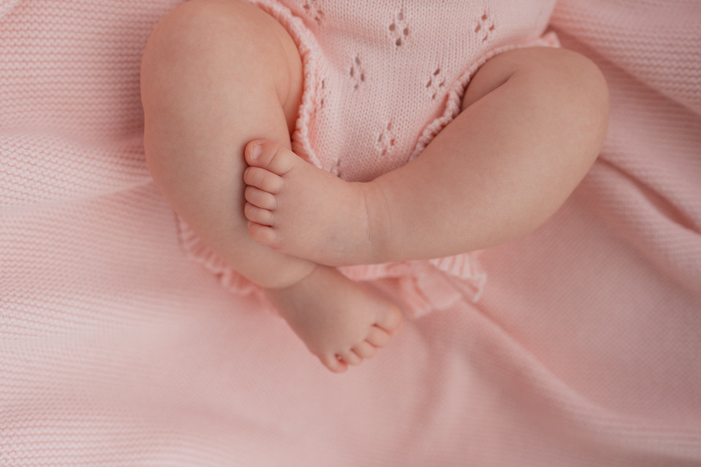 FRILL KNIT POINTELLE ROMPER | BABY PINK