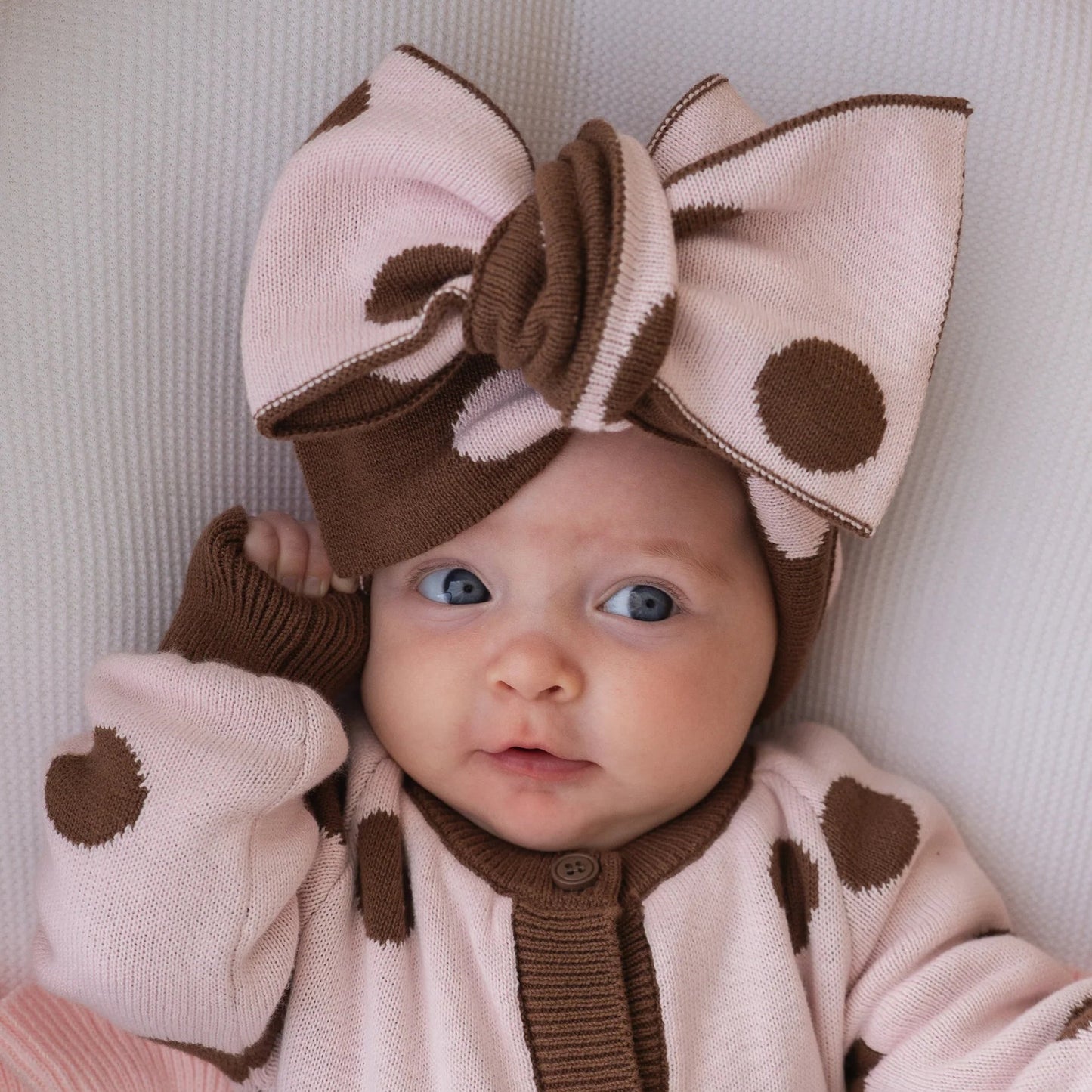 KNITTED OVERSIZED TOPKNOT | Choc Pink Polka